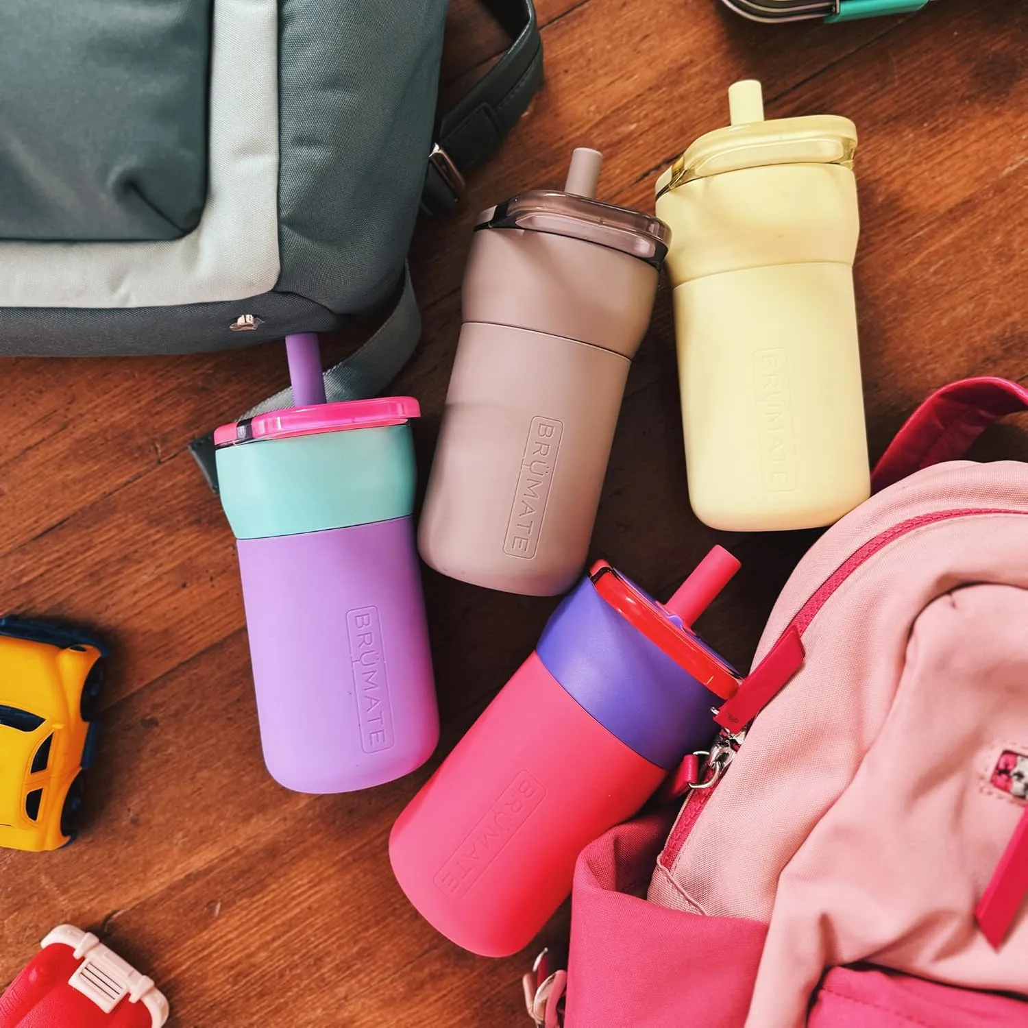 BrüMate Leap 12oz 100% Leakproof Kids Tumbler with Handle and Silicone Soft Straw | Drop Resistant Silicone Sleeve | For Kids 4  | Insulated Stainless Steel | Cup Holder Friendly | 12oz (Supernova)