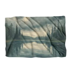 Reflective Pines under Grey Blanket