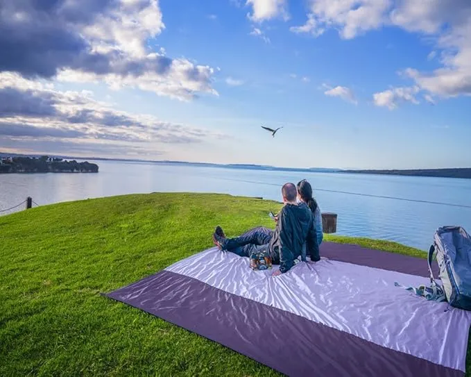 WEKAPO Beach Blanket Sandproof, Extra Large Beach Mat, Big & Compact Sand Free Mat Quick Drying, Lightweight & Durable with 6 Stakes & 4 Corner Pockets
