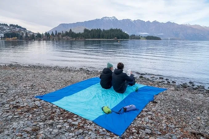 WEKAPO Beach Blanket Sandproof, Extra Large Beach Mat, Big & Compact Sand Free Mat Quick Drying, Lightweight & Durable with 6 Stakes & 4 Corner Pockets